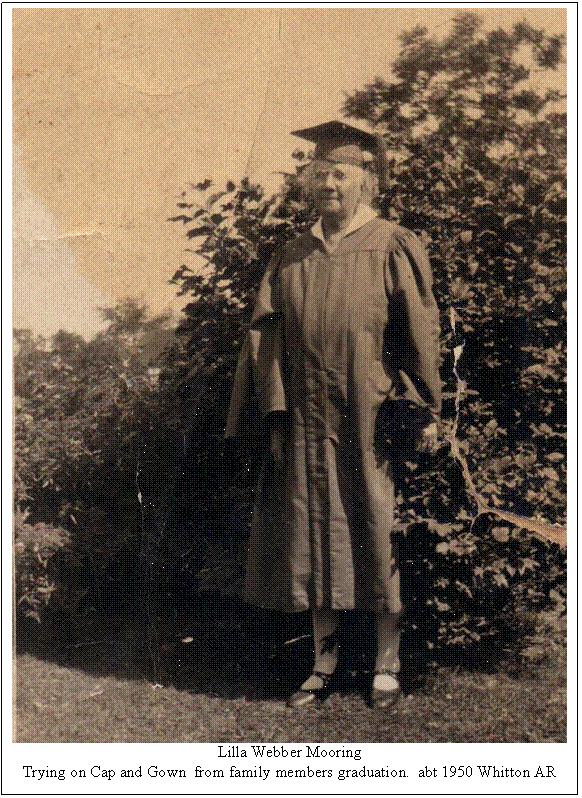 Text Box:  
Lilla Webber Mooring
Trying on Cap and Gown  from family members graduation.  abt 1950 Whitton AR
